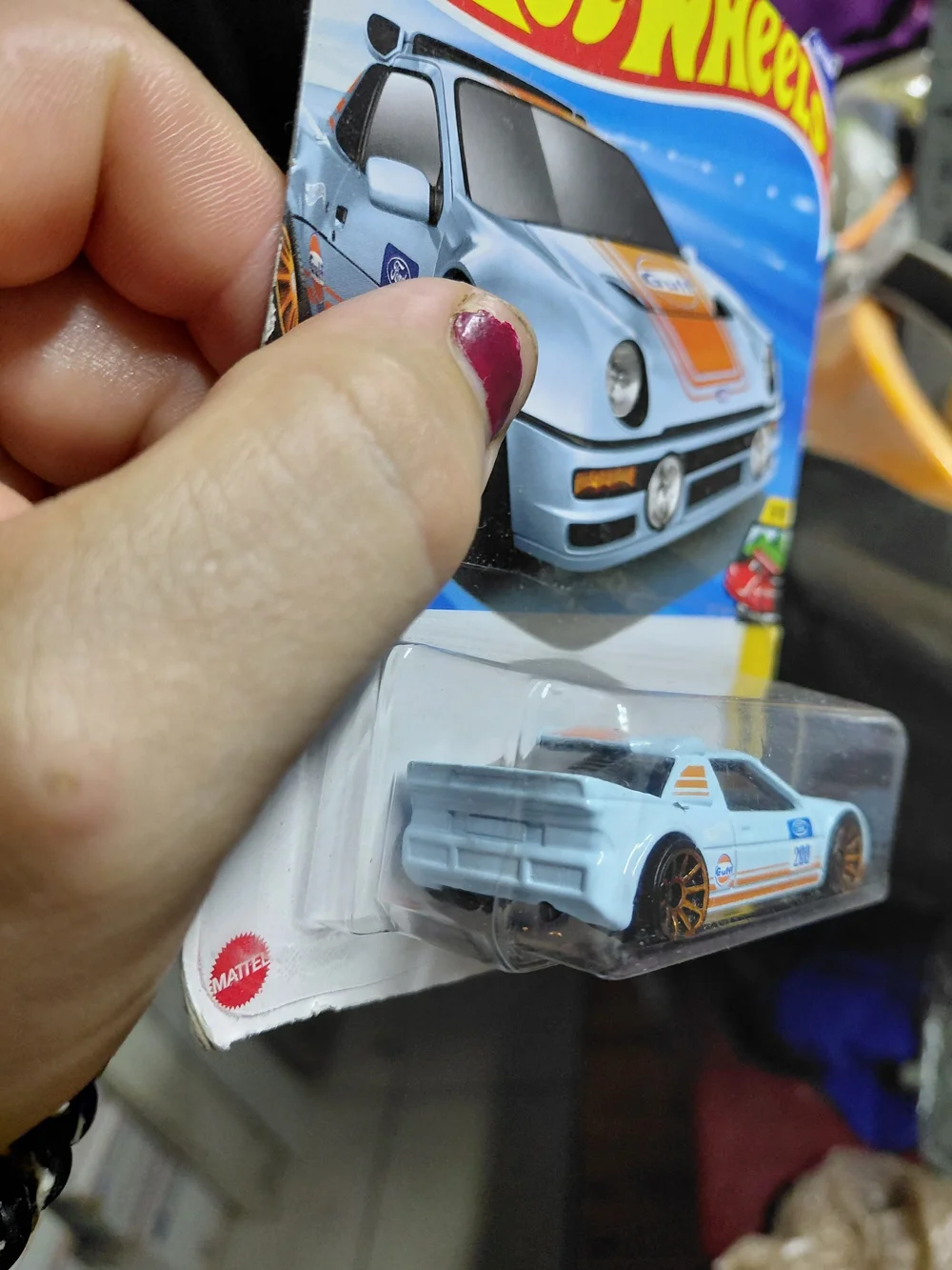 the Hot Wheels Ford RS200 in the iconic light blue and orange Gulf racing livery